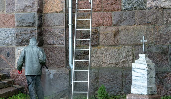 Expert pressure washing church building wall