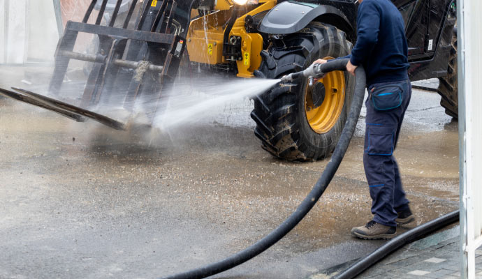 Machinery cleaning using pressure wash