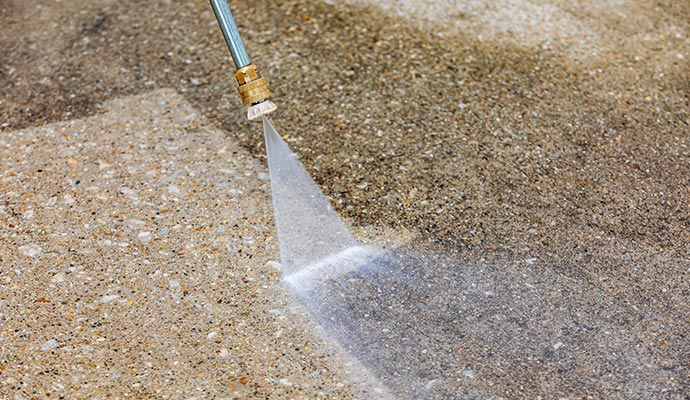 Professional worker pressure cleaning