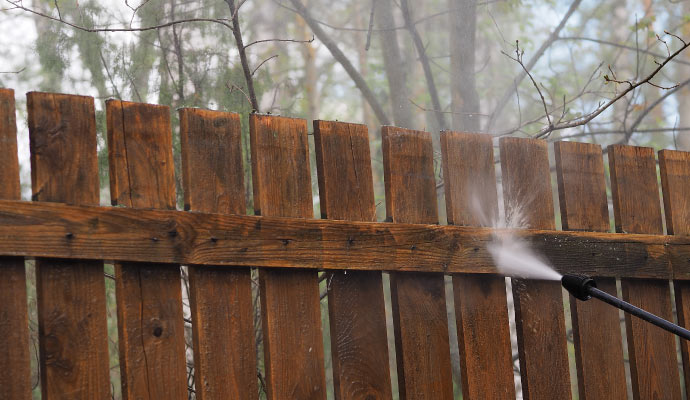 Fence pressure washing