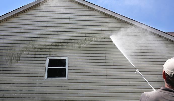 Pressure washing for house siding, ensuring thorough cleaning and maintenance.