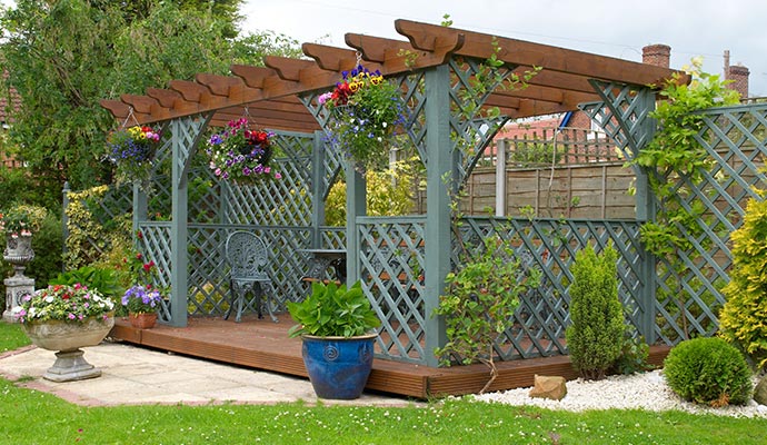 Clean and beautiful residential pergola setup in a landscaped garden