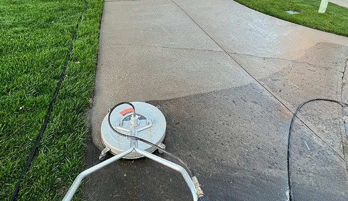 cleaning driveway to prevent slips and accidents