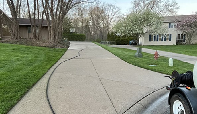 Driveway cleaning with pressure washing