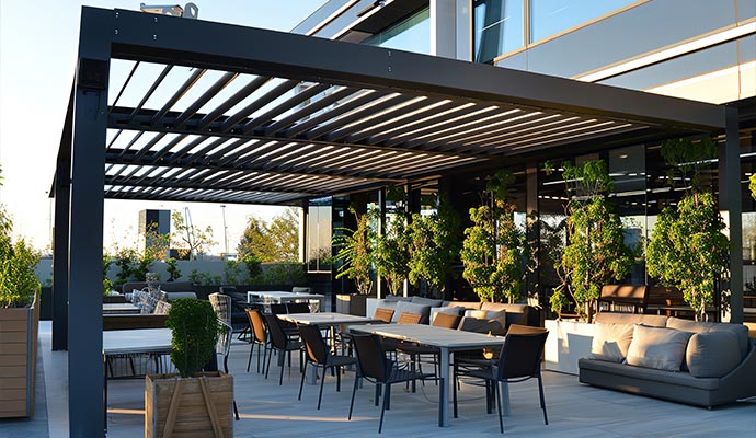 Luxury hotel outdoor seating area with pergola design