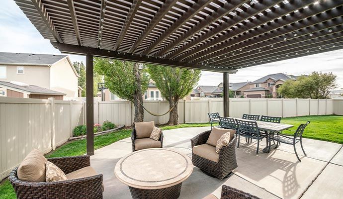 Beautiful outdoor seating area with freshly cleaned pergola