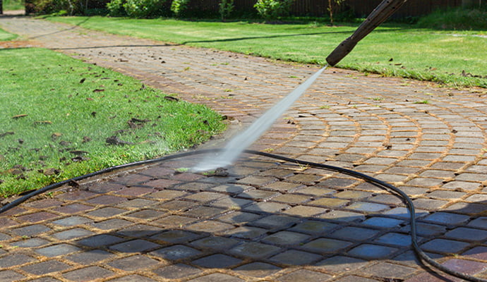Sidewalk cleaning with pressure washing