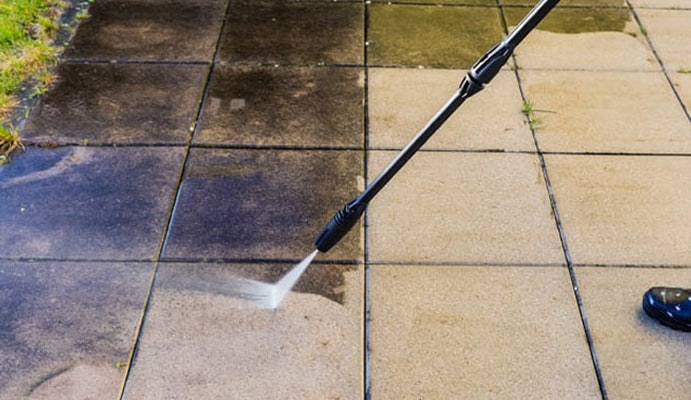 Stain removal service from brick paver by pressure washing