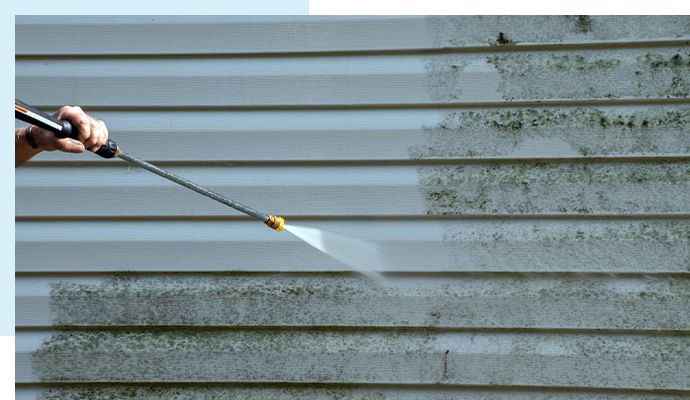 Residential soft wash cleaning for home exteriors