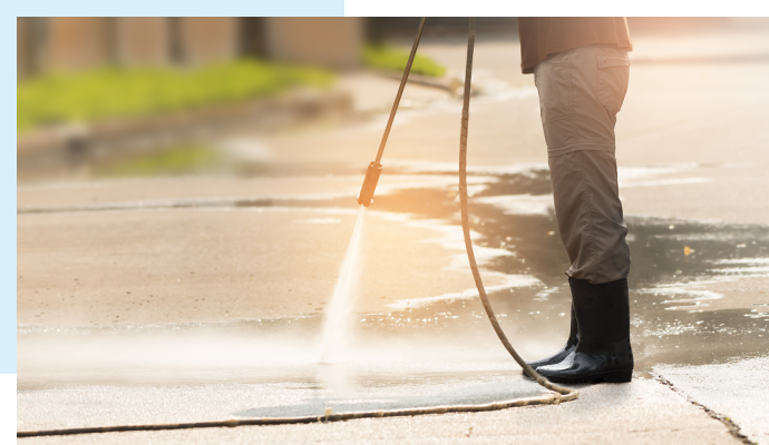 Cleaning sidewalks with pressure washing for a fresh look.
