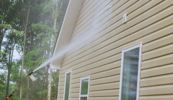 Pressure washing for the siding of a house