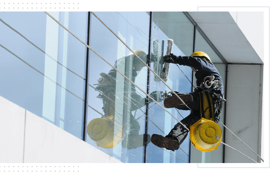 Window soft washing for a commercial building