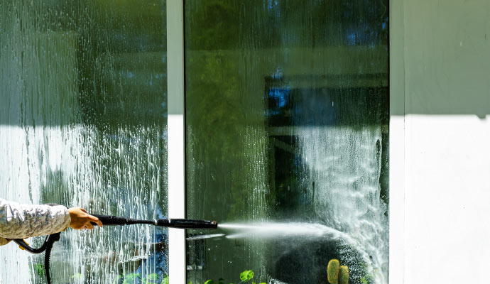 Pressure washing service for window